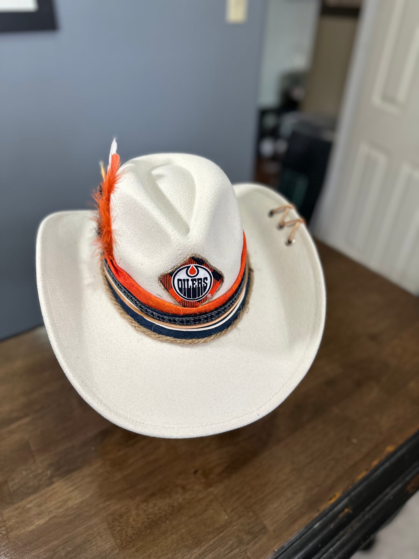 cowboy style oilers hat.