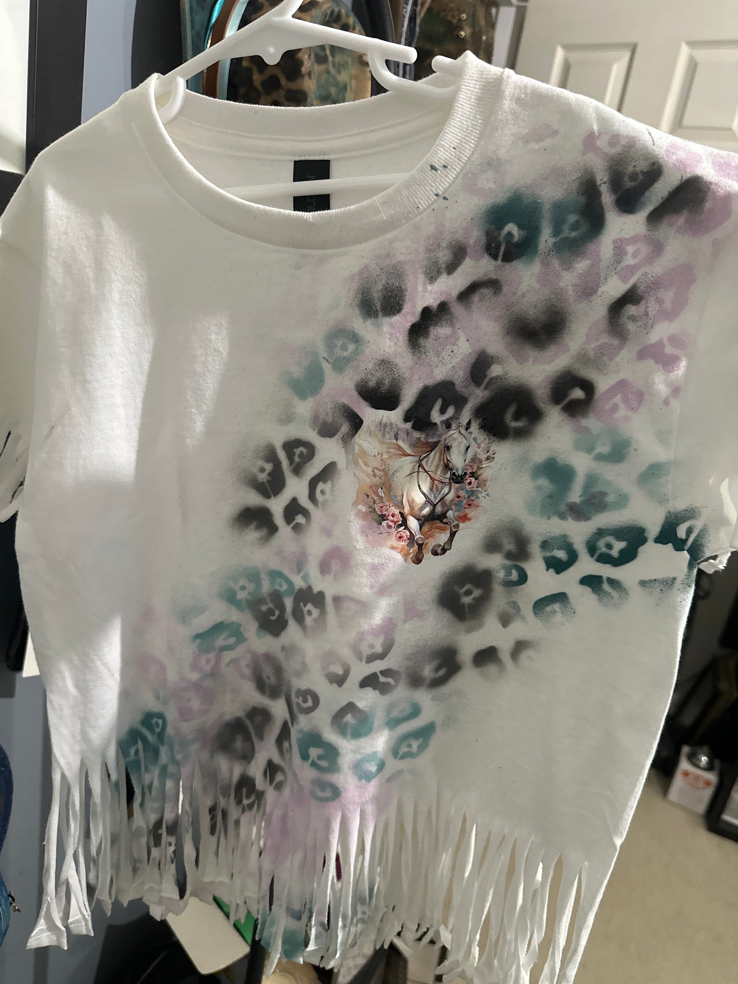 Down on the farm T-shirt and trucker hat.